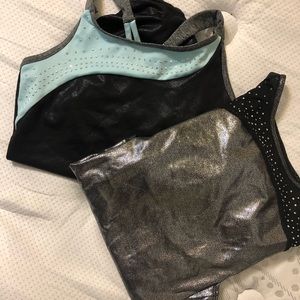 Two girls justice leotards